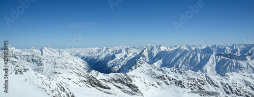 Winter landscape - Panorama of the ski resort with ski slopes. Alps. Austria. Pitztaler Gletscher. Wildspitzbahn photo