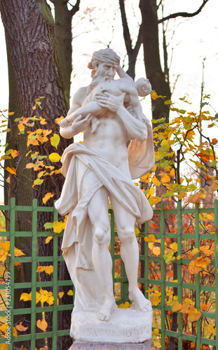The God Saturn statue at evening.