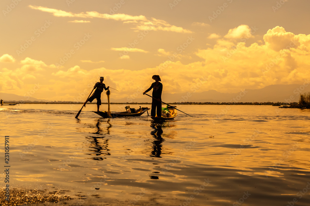 Travel Asia, Myanmar (Burma). Traditional Burmese Fishermen at Inle lake.