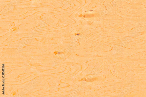 The texture of natural birch veneer with knots. The surface of birch plywood.