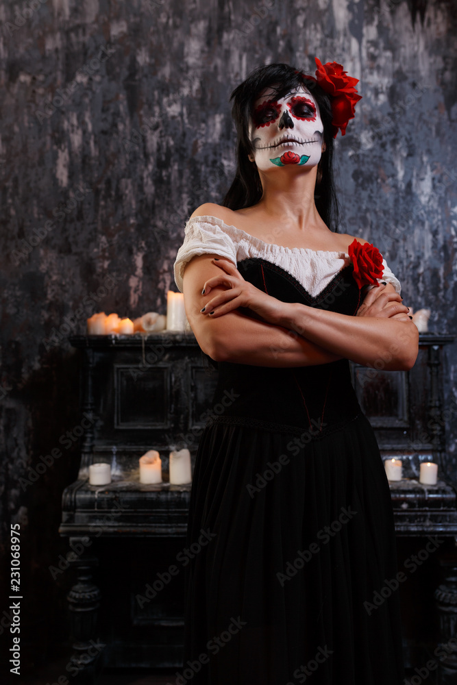 Fototapeta premium Halloween image of zombie woman with makeup