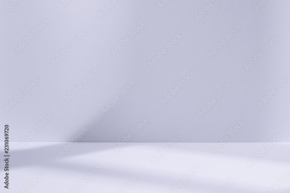 Light blue studio space with window shadow