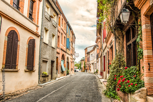 Fototapeta Naklejka Na Ścianę i Meble -  Main street of Saint Ybars village. Middi Pyrenees . France.