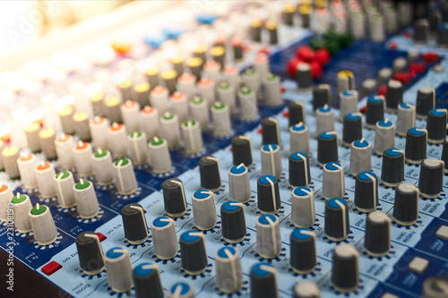 The encoders of mixing consile in yellow light