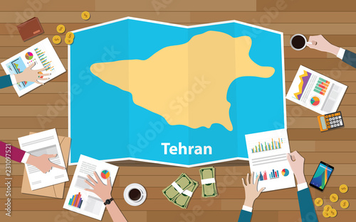 tehran iran capital city region economy growth with team discuss on fold maps view from top