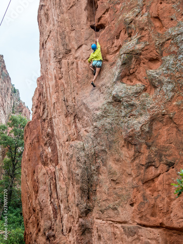 A girl doing rock climbing