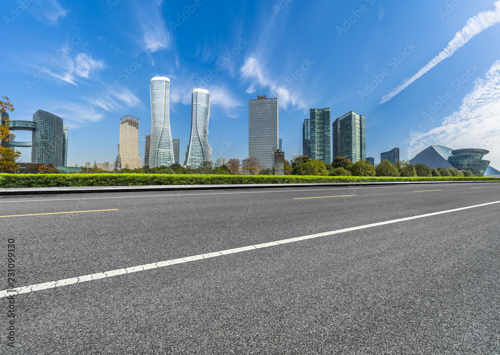 empty urban road with modern building in the city.