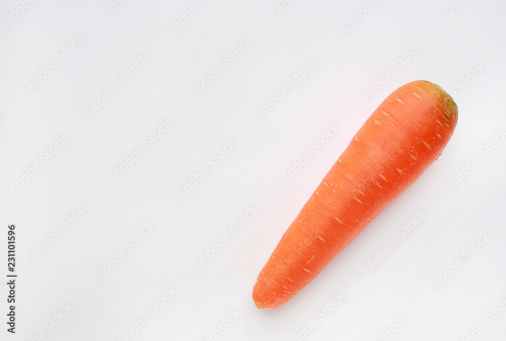 Carrot over white background with copy space.