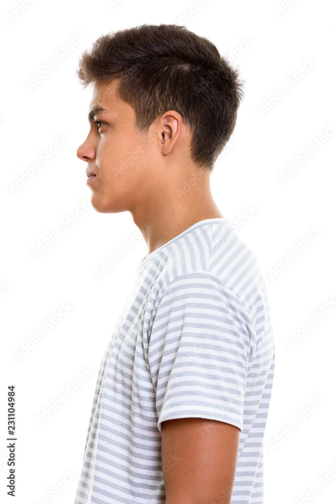 Profile view of young handsome man standing Profile view of young handsome man standing