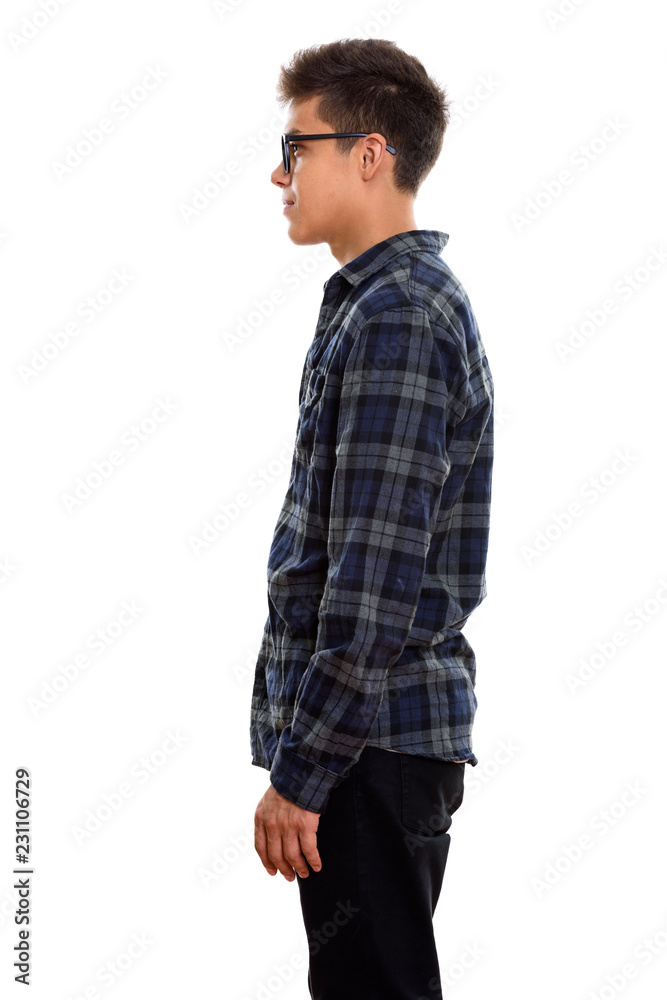 Profile view of young handsome man standing Profile view of young handsome man standing
