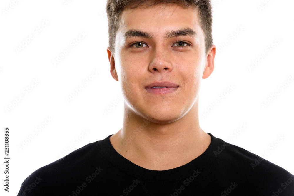 Close up of young handsome man looking at camera Close up of young handsome man looking at camera