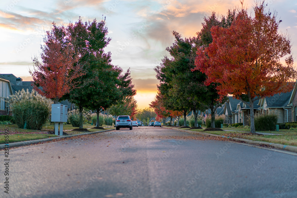 Living in Residential Housing Neighborhood Street at Sunset in Bentonville Arkansas
