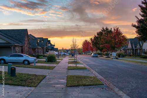 Living in Residential Housing Neighborhood Street at Sunset in Bentonville Arkansas