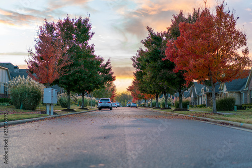 Living in Residential Housing Neighborhood Street at Sunset in Bentonville Arkansas