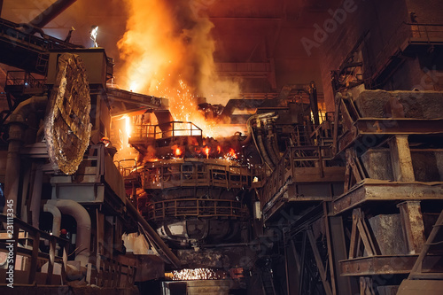 Melting of metal in a steel plant. High temperature in the melting furnace.