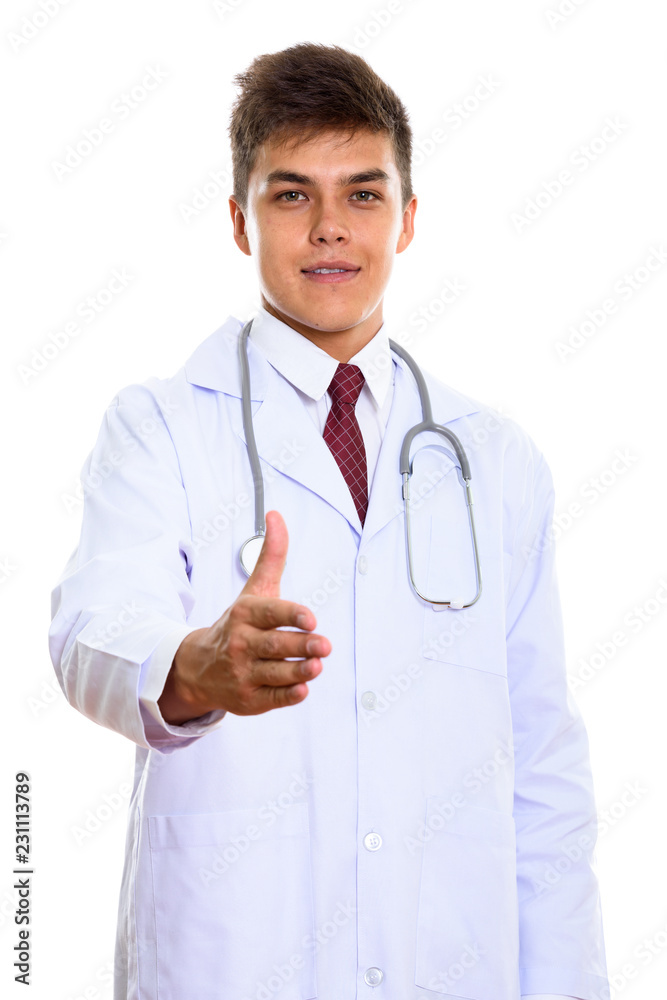 Studio shot of young handsome man doctor giving handshake Studio shot of young handsome man doctor giving handshake