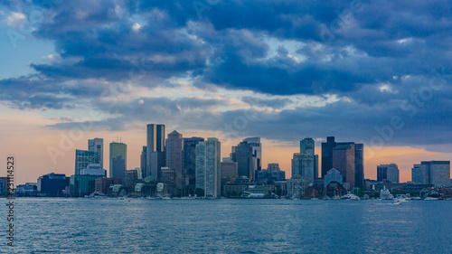 Skyline of downtown Boston over water at sunset  in Boston  USA