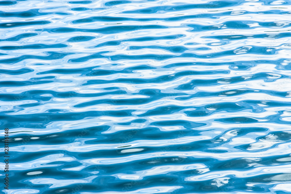 Fototapeta premium Ripple Water in swimming pool with sun reflection