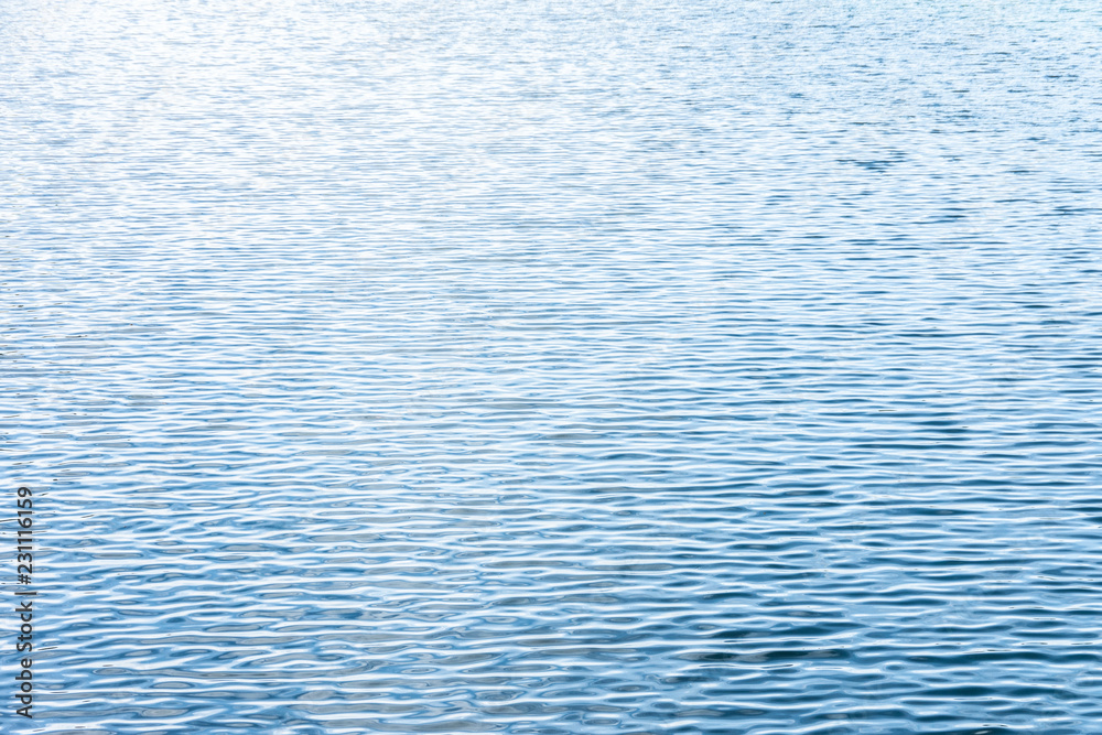 Ripple Water in swimming pool with sun reflection Ripple Water in swimming pool with sun reflection