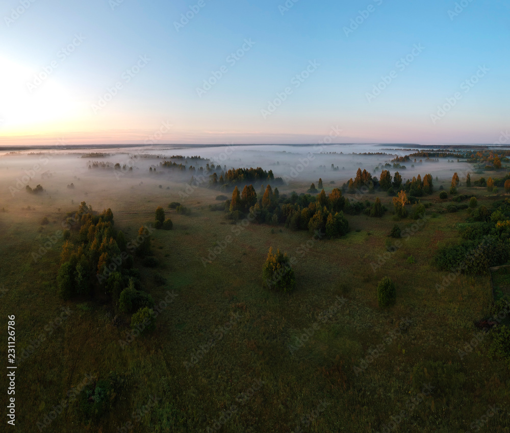 View of the track and fields at dawn with quadrocopter View of the track and fields at dawn with quadrocopter
