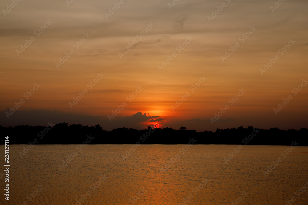 Beautiful sunset over the reservoir Sky background sunset
