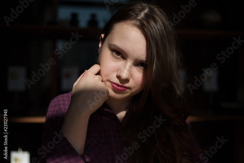 girl sitting at the table