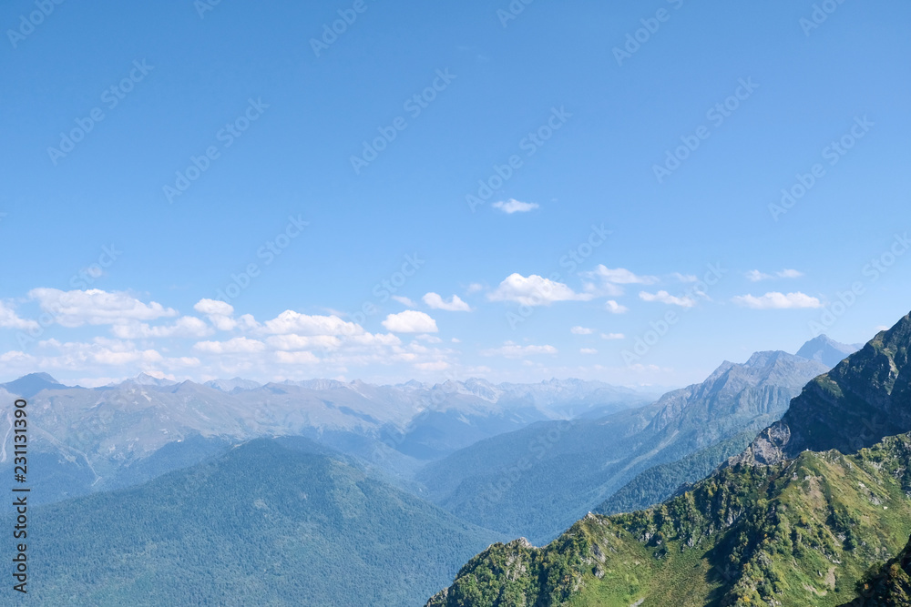 Beautiful mountain valley, top view with clouds. Non-urban scene. Travel destination.