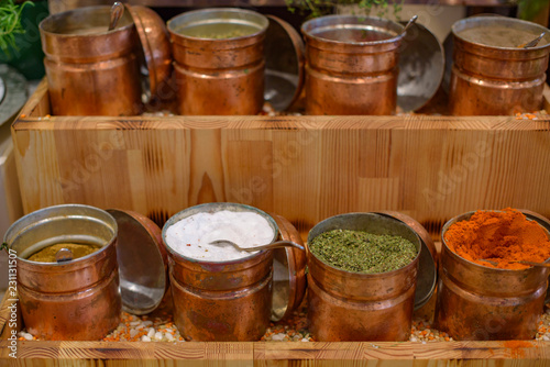spices in metal bowls