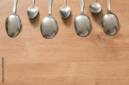 Tablespoon and teaspoon set background.
