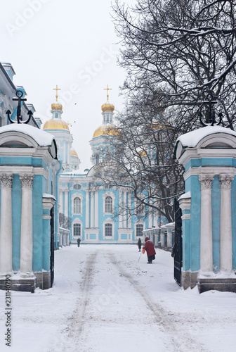 Saint Petersburg in winter. Road to the St. Nicholas Epiphany Naval Cathedral in snowfall (Nikolskiy Morskoy Sobor) photo