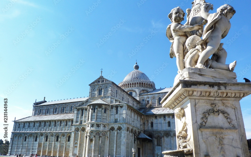 PIsa Cathedral in Square of Miracles with the fountain of cherubs in the foreground, Tuscany, Italy