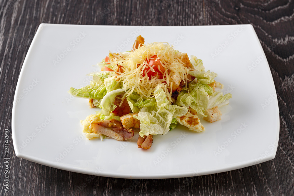 Fruit and vegetable salad with meat. Side view. Fruit and vegetable salad with meat. Side view.
