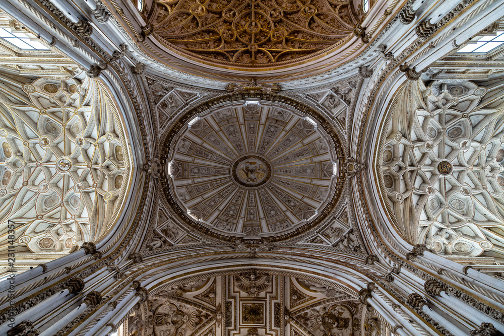 Oct 2018 - Cordoba, Spain - The oval shaped ceiling of Mezquita, Catedral de Cordoba, a former Moorish Mosque that is now the Cathedral of Cordoba. Mezquita is a UNESCO World Heritage Site.