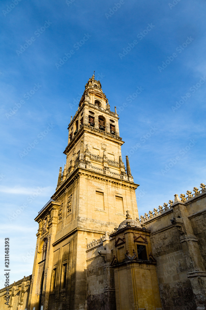Bell tower and former minaret of the Mezquita, Catedral de Cordoba, a former Moorish Mosque that is now the Cathedral of Cordoba. Mezquita is a UNESCO World Heritage Site.