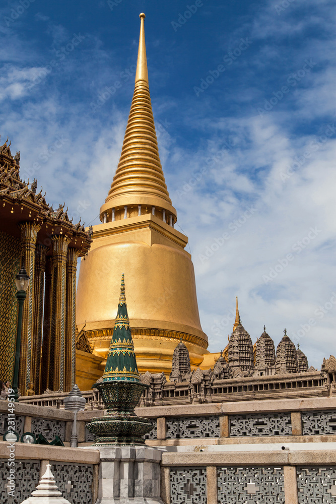 Fototapeta premium Golden Chedi and Scale Model of Angkor Wat