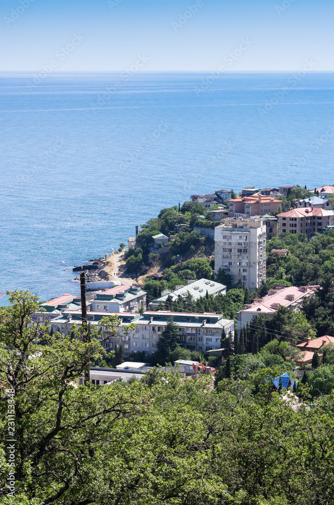 Resort city by the sea. Russia, Republic of Crimea. 06/12/2018: Foros urban-type settlement. View from the South Coast Highway