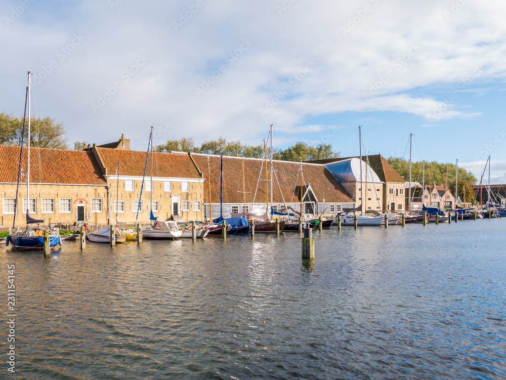 Warehouses in east harbour of historic city of Enkhuizen, Noord-Holland, Netherlands Warehouses in east harbour of historic city of Enkhuizen, Noord-Holland, Netherlands