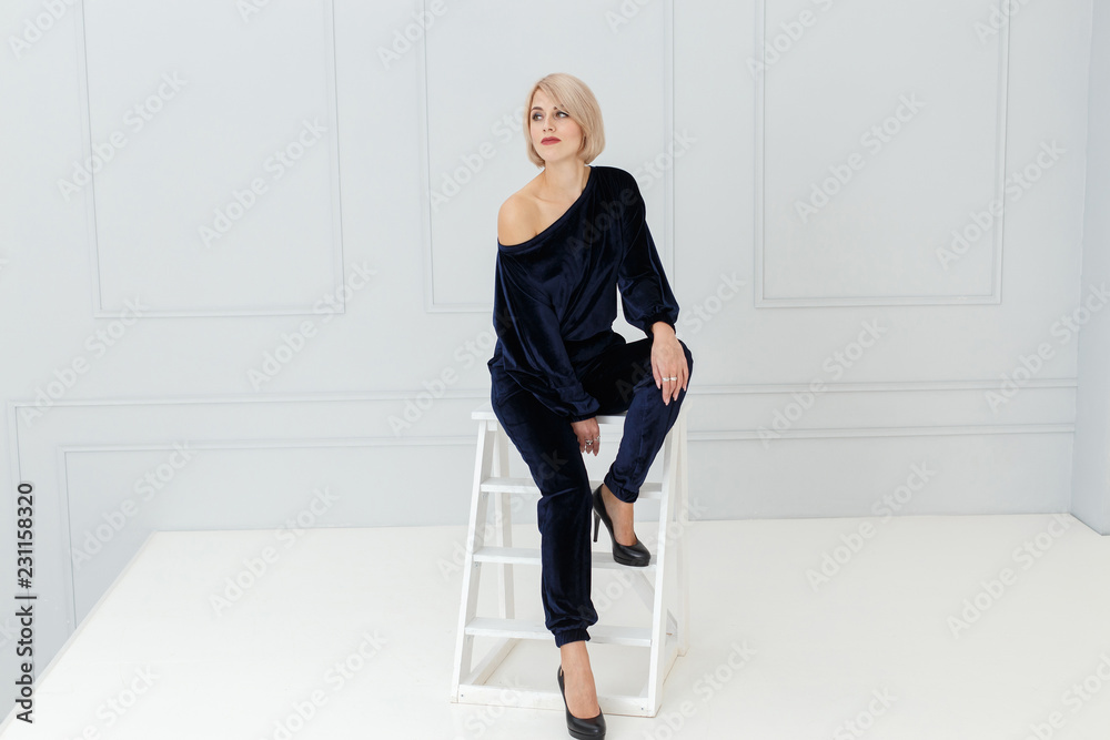 Fashion portrait of woman in black suit Fashion portrait of woman in black suit