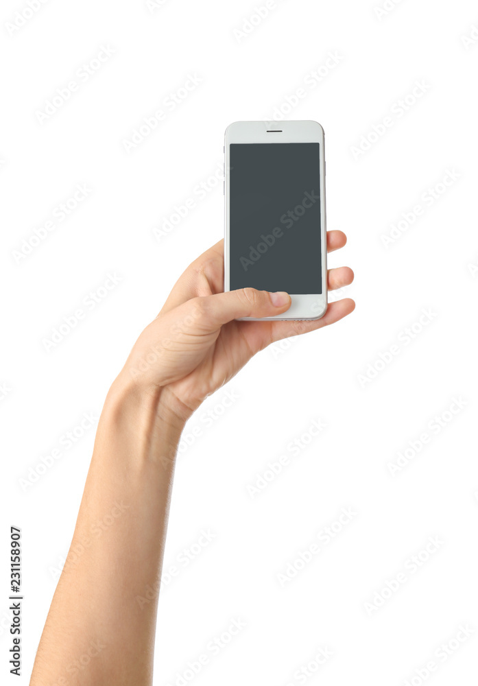 Young woman holding mobile phone on white background