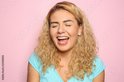 Portrait of happy young wom...