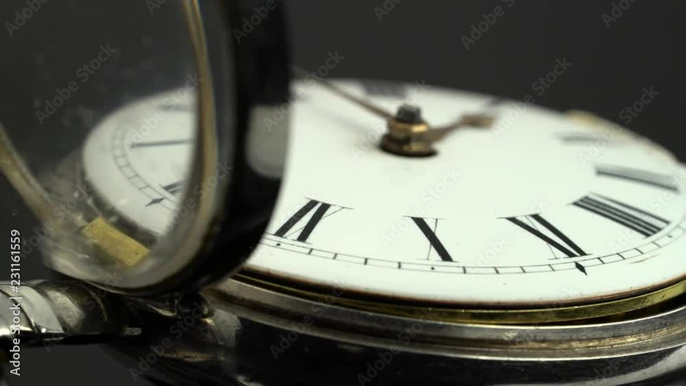 Dial pocket watch closeup. Black background. Sound Dial pocket watch closeup. Black background. Sound