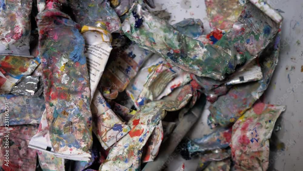 Tubes of used oil paint are in the box. Old tubes of oil paint. 4K