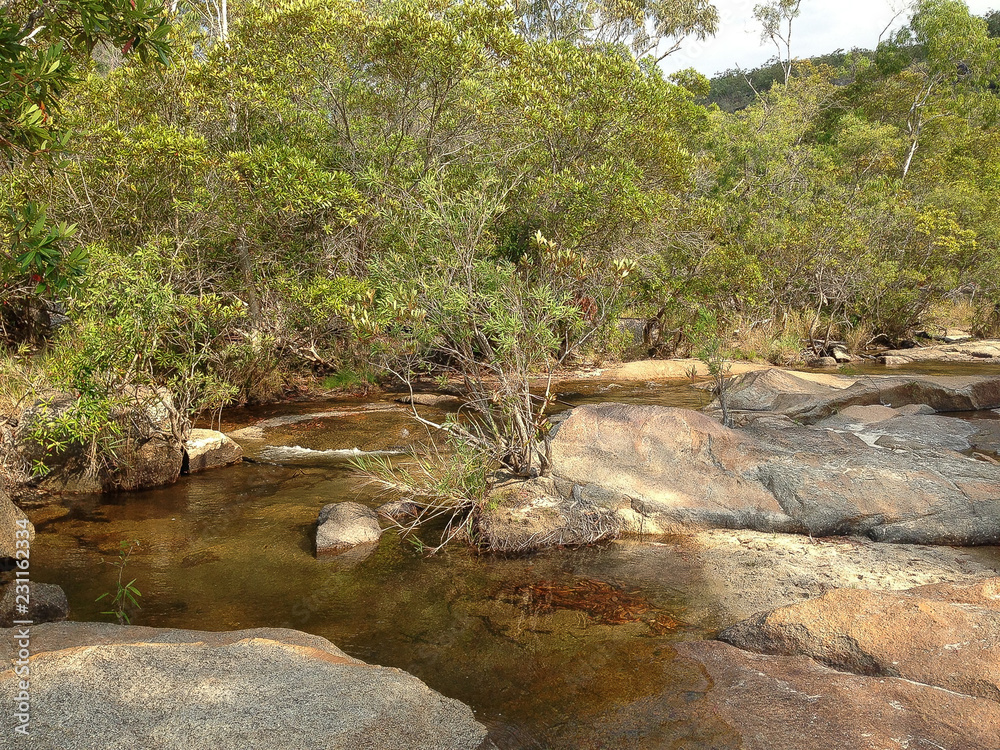Real Australian nature and hard country outbacku civilization many small rock hills with water falls Real Australian nature and hard country outbacku civilization many small rock hills with water falls