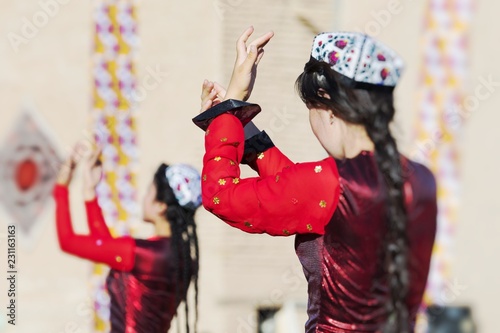 Folk dancers performs traditional dance at local festivals in Khiva, Uzbeksitan. photo