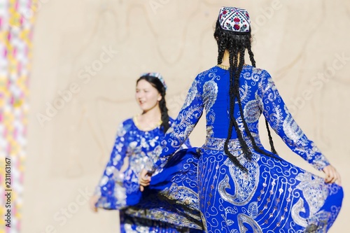 Folk dancers performs traditional dance at local festivals in Khiva, Uzbeksitan. photo