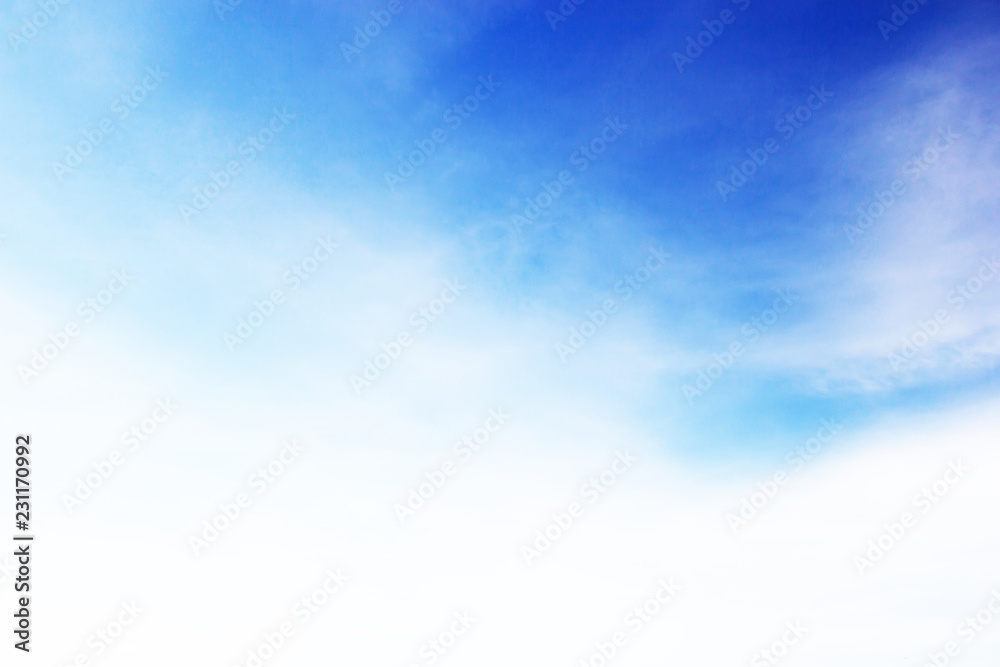 Fototapeta premium Blue sky background and white clouds soft focus, and copy space