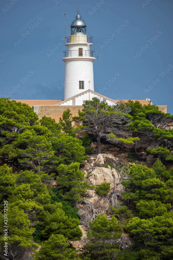 Capdepera lighthouse, Far de Capdepera, at Punta de Capdepera in Cala Rajada, Capdepera, Mallorca, Balearic Islands, Spain