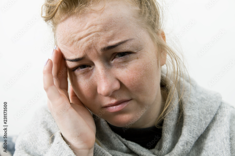 Young woman big headache at home portrait