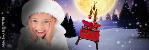 Composite image of cute little girl wearing santa hat 