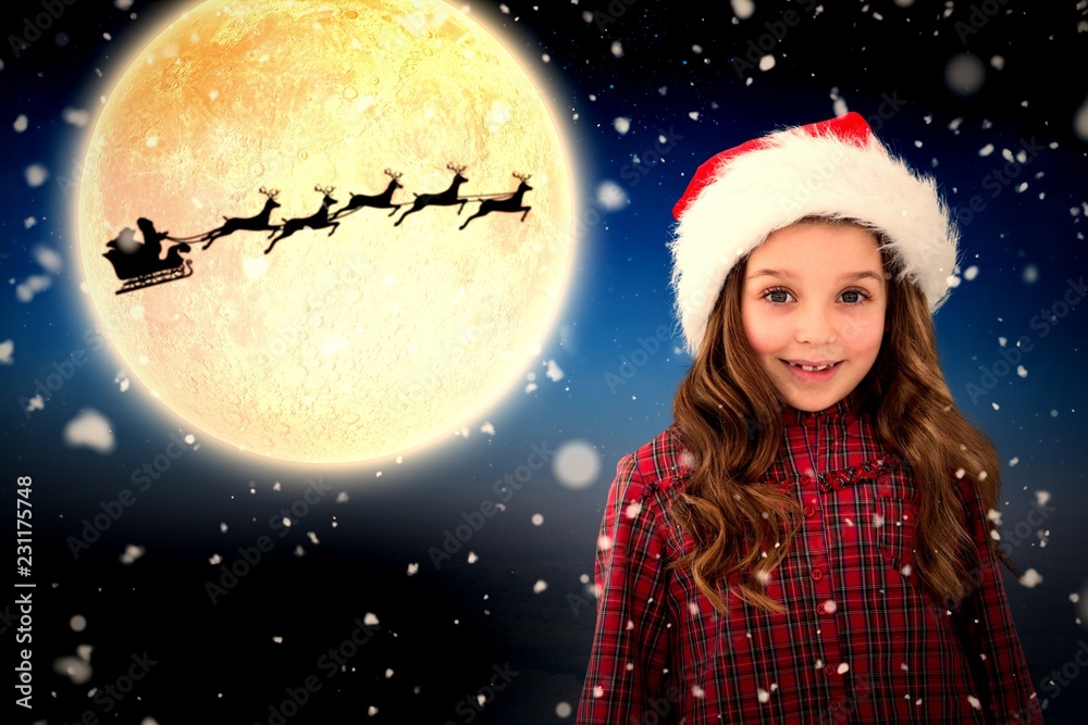 Composite image of cute girl in santa hat Composite image of cute girl in santa hat